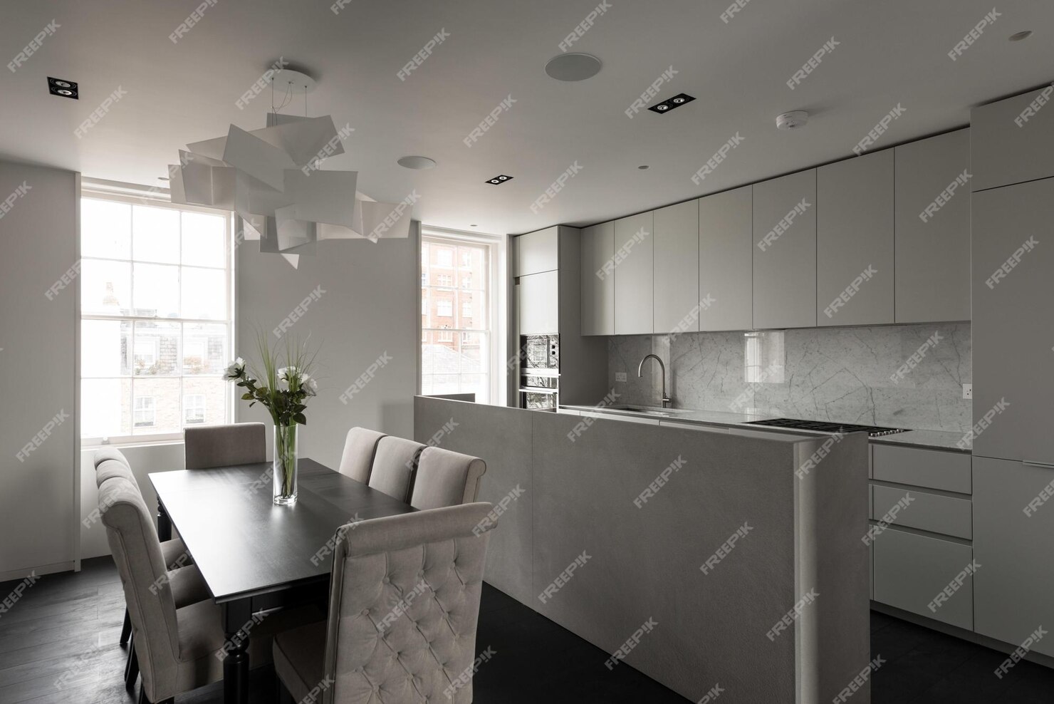 kitchen-with-table-chairs-table-with-vase-flowers-it_1036536-7896